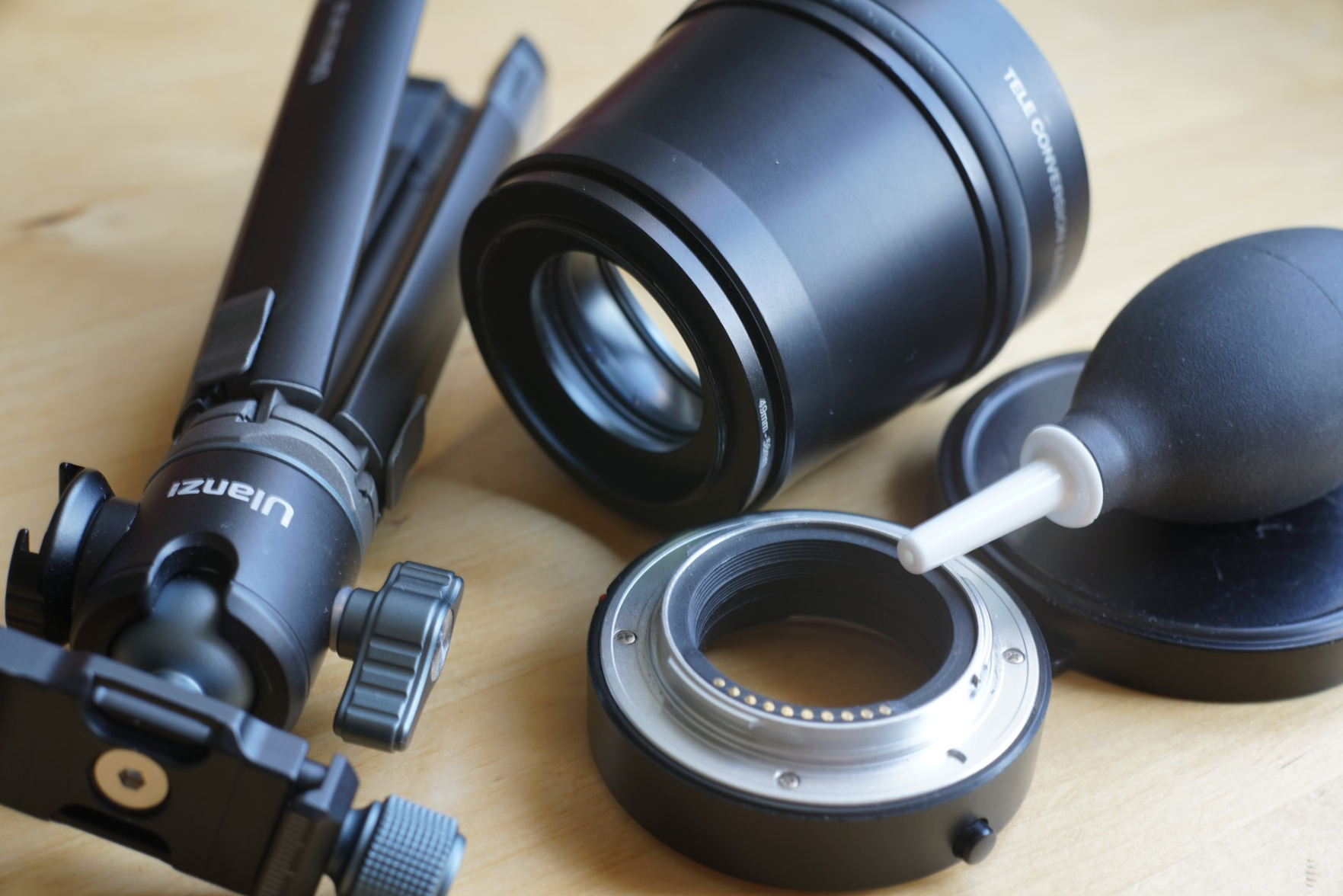 mini-Stativ, Telekonverter, Makro-Ringe und Reinigungs-Pumpe