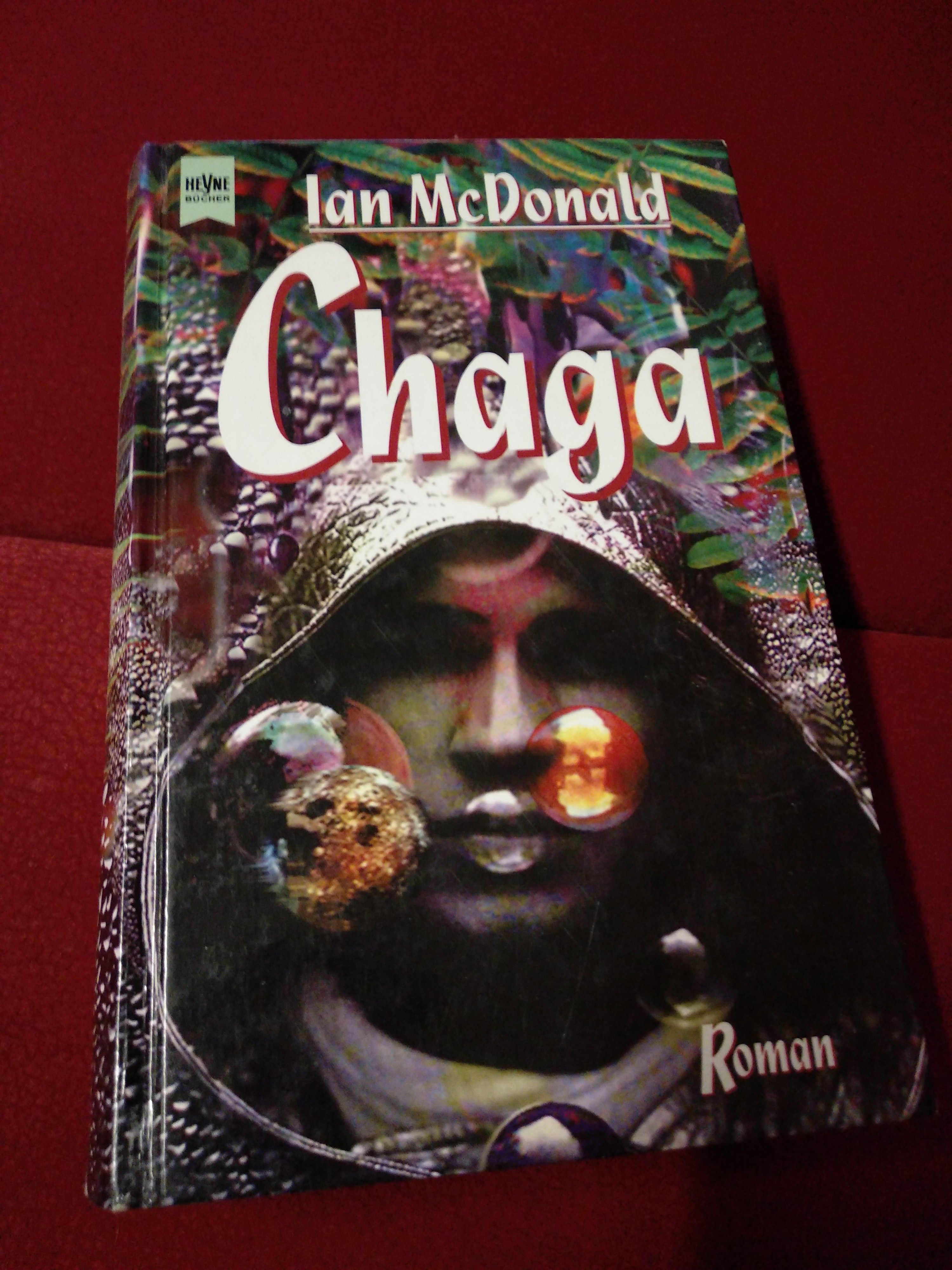 Titelbild des Buchs "Chaga" von Ian McDonald, erschienen als Hardcover im Heyne-Verlag Titelbild des Buchs "Chaga" von Ian McDonald, erschienen als Hardcover im Heyne-Verlag